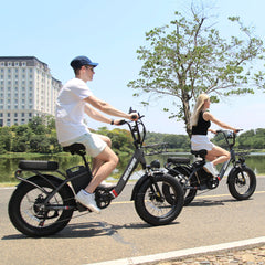 Couple riding Burchda U8 electric bikes